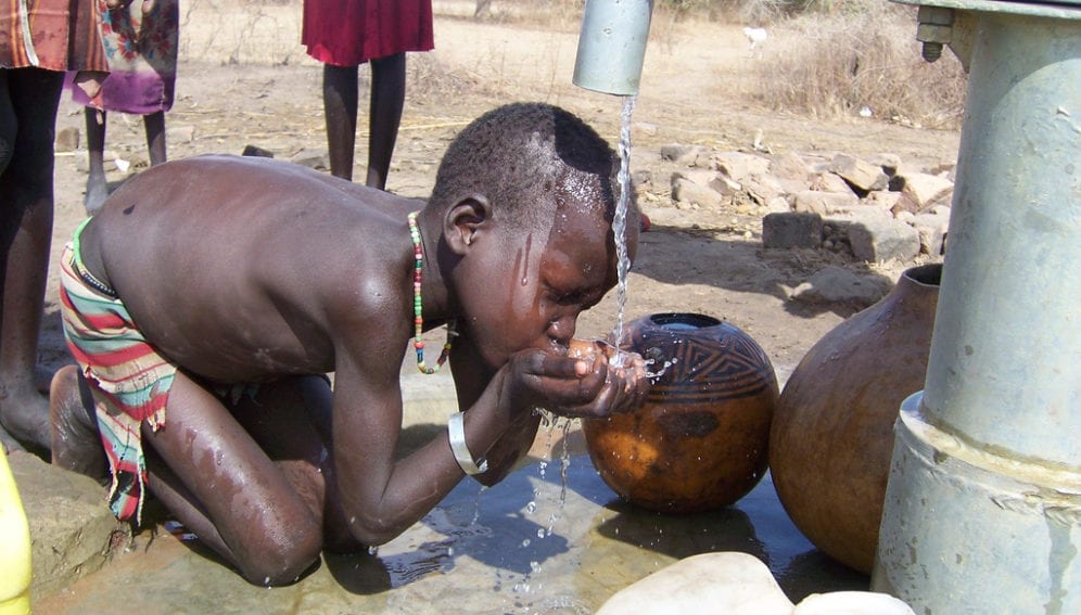 child_at_waterpump_FLickr_WaterforSouthSudan_1024x768