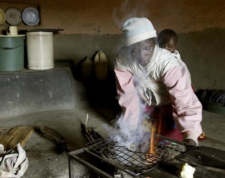 cooking over an indoor open wood fire
