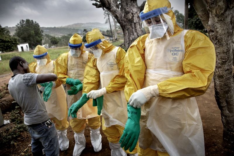 health workers in full protective clothing