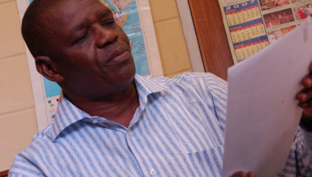 Scientist_reading_Flickr_IITA Image Library 1024x681.jpg