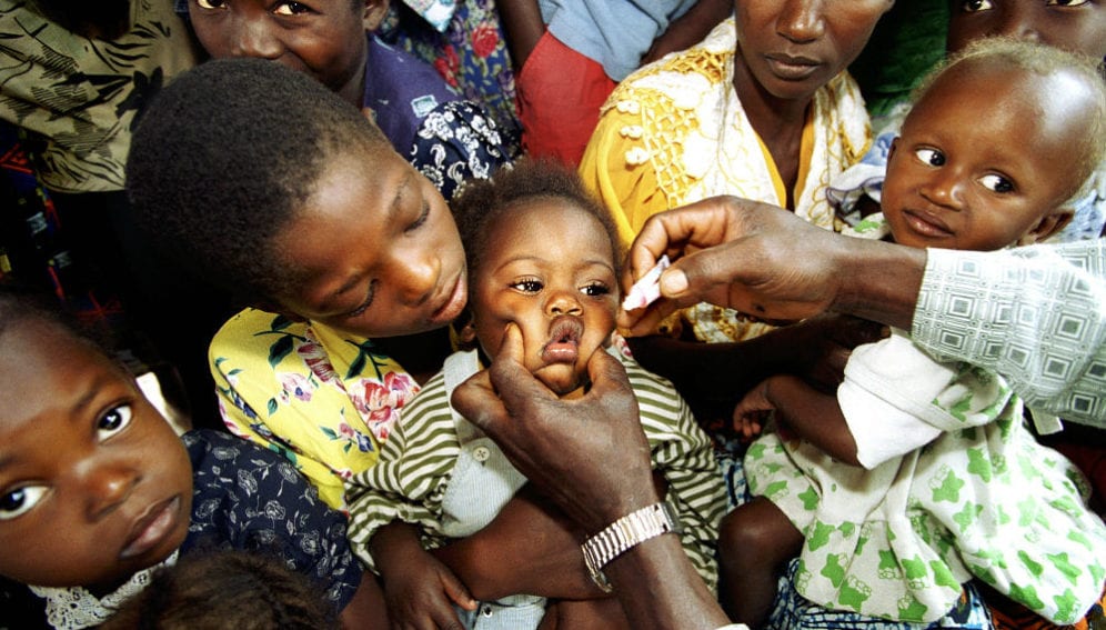 Vaccination team visits a pygmy settlement