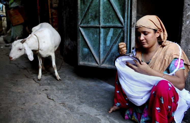 woman does some stitching