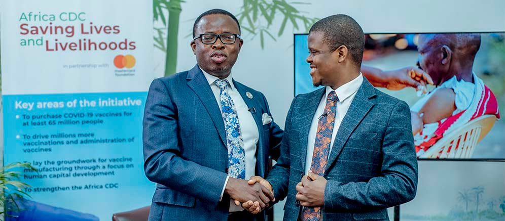 Africa CDC's Tajudeen and Paul exchanged pleasantries after their interview