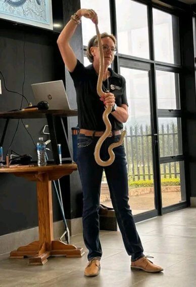 Litschka-Koen holding a snake.