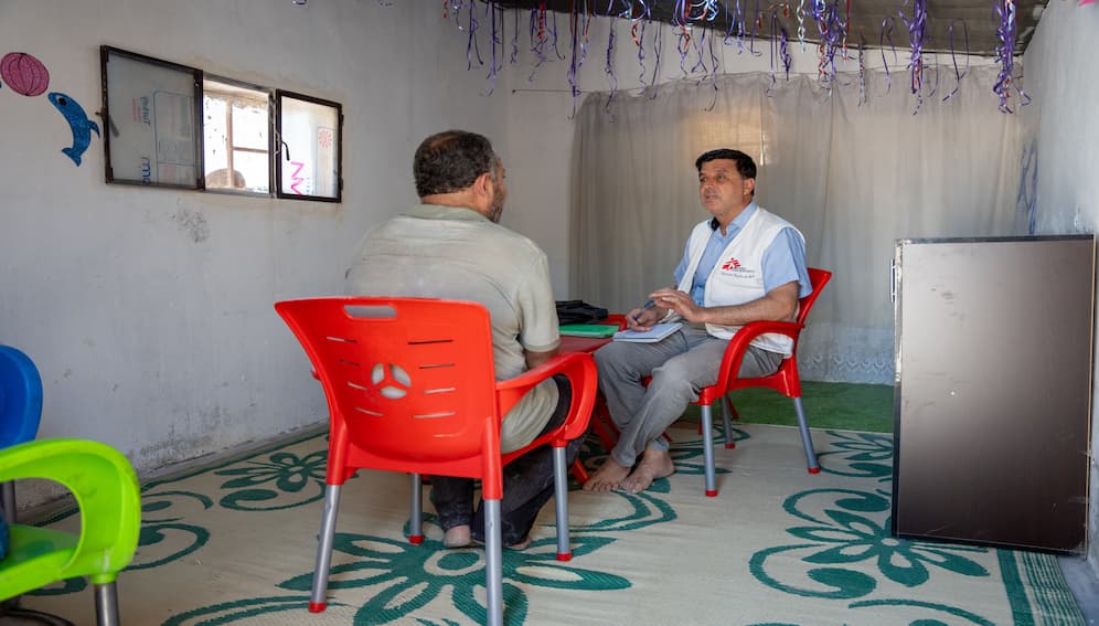 An MSF counsellor provides psychological support to a displaced person in northwestern Syria. Photo credit: Abdulrahman Sadeq MSF