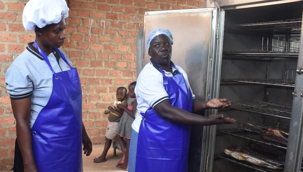 Princilla Nakato, narrates their story with at the Women of Hope Katosi Fish Processing Association. Photo by Abraham Kibirige