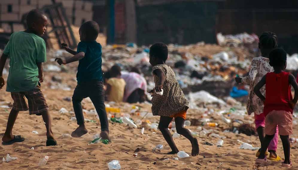 Children playing in a garbage dump. Photo by B. Aristotlè Guweh Jr: https://www.pexels.com/photo/children-playing-in-a-garbage-dump-in-africa-27848723/