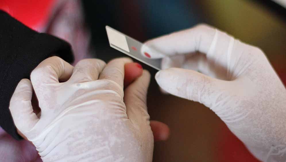 Malaria_diagnotics_MAIN Rapid diagnostic malaria test. Photo by Wellcome Trust. Original public domain image
