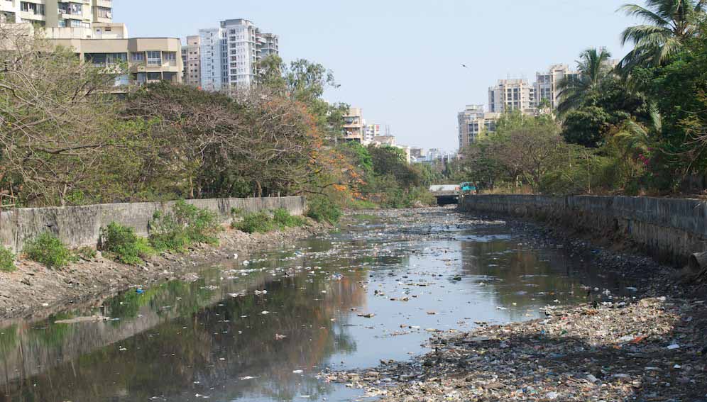 Mumbai's creeks are clogged with untreated sewage, garbage and debris from construction. In a recent study conducted by TERI ( The Energy and Resource Institute), Mumbai has been ranked most vulnerable among India's coastal ecosystems. By: Ravi Khemka (CC BY 2.0.)