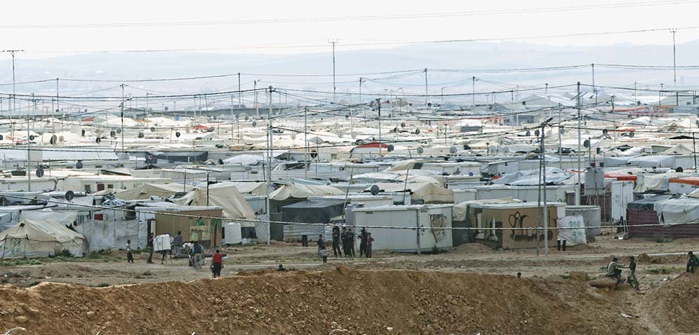 A general view shows a mix of trailers and tents in Jordan's Zaatari refugee camp. The camp, which has gradually evolved into a permanent settlement, was first opened in July 2012 to host Syrians fleeing the violence of their country's conflict that erupted in March 2011. Photo : Marcel Crozet / ILO