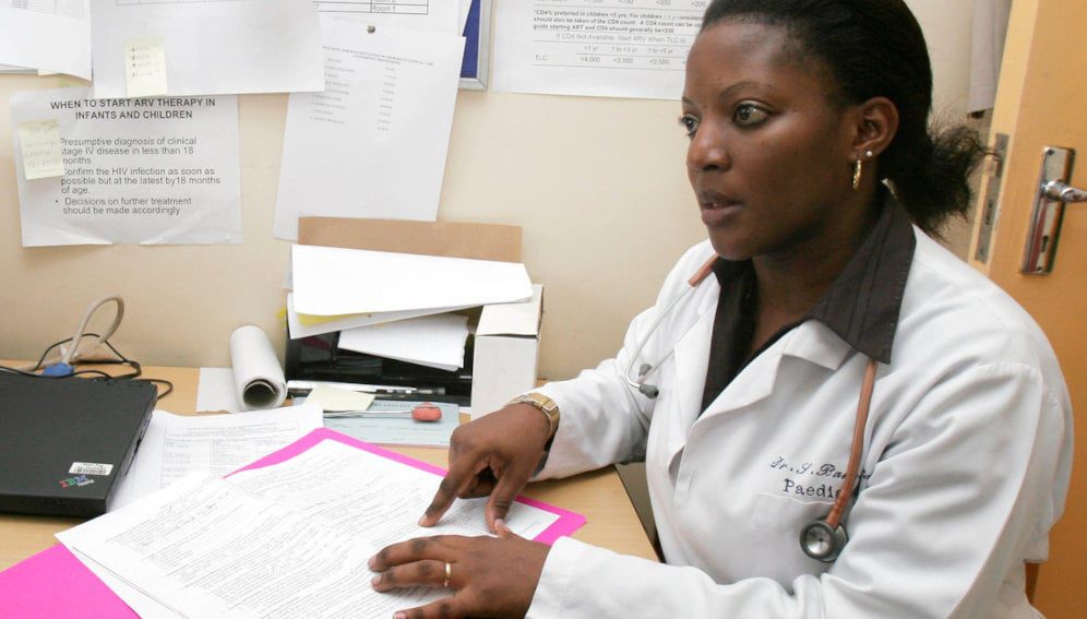 Infectious Disease Institute, doctor discusses case in pediatric clinic