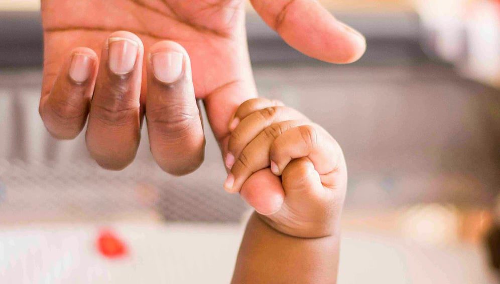Photo by Lombe K: https://www.pexels.com/photo/baby-and-parent-holding-hands-4657988/