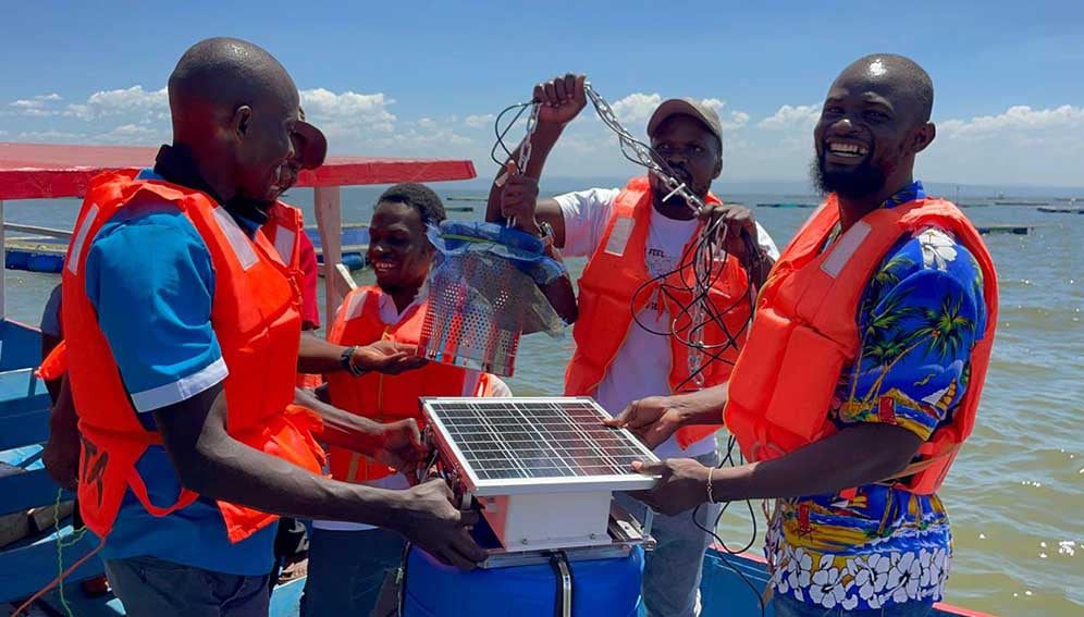 Fish farmers, techies and researchers during the installation of the sensor-mounted buoys near Dunga Beach on Lake victoria. Photo courtesy of ShoShin Innovation Hub
