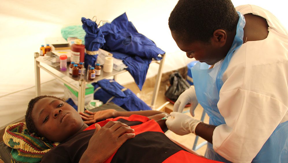 A young woman getting an implant because she wants to delay her next pregnancy.
